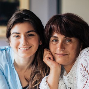 A woman with her mother at home