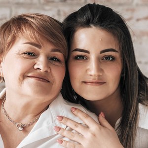 A woman with her mother at home